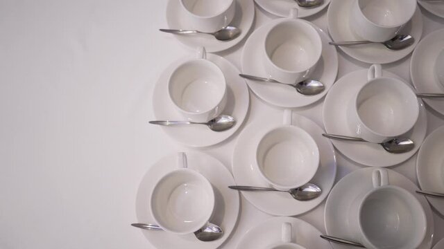 Many empty white clean tea cups