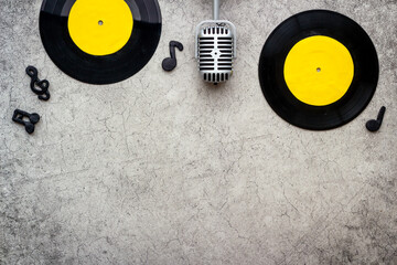 Vinyl record with microphone, music flat design background