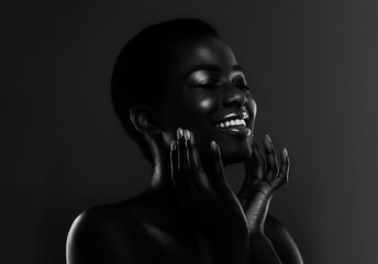 BW portrait of sensual beautiful african american female model touching face