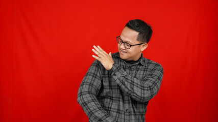 Funny Asian man stylish isolated red background