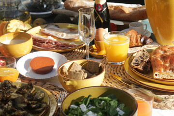 brunch with artichokes mussels croissants fruits brocoli feta salad ham bread and many other food and drink