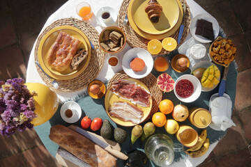 brunch with artichokes mussels croissants fruits brocoli feta salad ham bread and many other food and drink