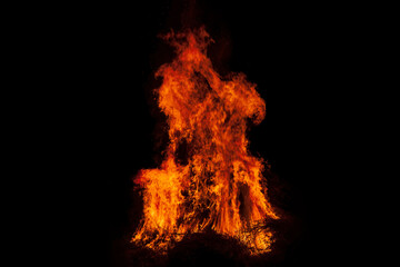 Fire flames on black background. Bonfire. Fire flame texture for background