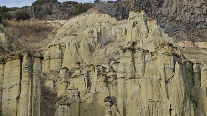 View of the Kuladokiya mountains. An unusual volcanic rock formation in the city of Kula, Turkey.