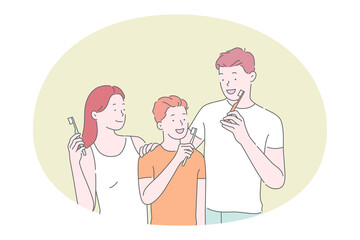 Brushing teeth and dental hygiene concept. Happy family with son cleaning teeth with toothpaste and toothbrush all together in bathroom. Morning routine for all family members 