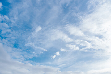 Fototapeta premium Blue sky background with beautiful tiny clouds white shape and khem freedom in the vast quiet bright atmosphere day.