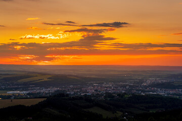 Colorful gold red sunset over Beskydy landscape and surrounding nature.