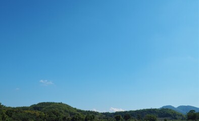 Fototapeta premium Blue sky with clouds with mountain