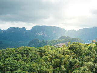 Fototapeta na wymiar beautiful landscape of mountain with cloudy sky and greenery in rainy season at Doi Tapang, Sawi District, Chumphon, Thailand.