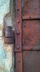 Old metal door hinge close up