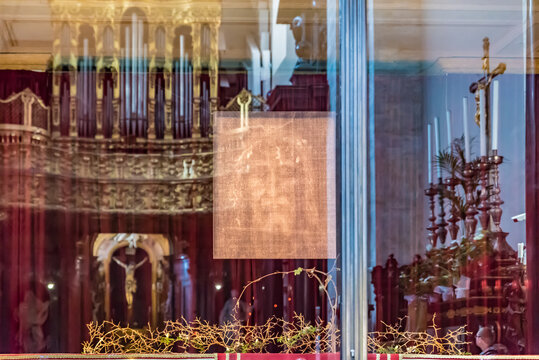 TURIN, ITALY - JULY 14, 2019: Turin Shroud (Italian: Sindone di Torino) is protected by bulletproof glasses in the the Cathedral of Turin, Italy.