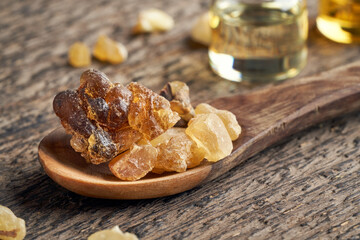 Frankincense resin on a wooden spoon