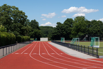 Naklejka premium empty racetrack with sports field