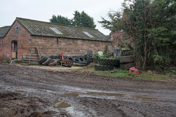 Old tires stored in a farm yard