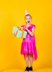 big surprise. kid holding gift package. holiday preparation and celebration childhood happiness. cute child go shopping. happy birthday party. boxing day concept. beautiful teen girl with present box