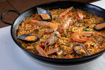 Spanish seafood Paella ,with crayfish, squid, mussel and prawn