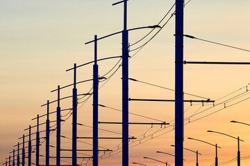 Lampposts on the background of the evening sky sunset