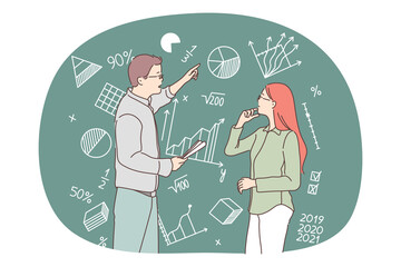 Mathematics, statistics, data concept. People business partners team or teachers in university standing and discussing math formula for development and sharing ideas near blackboard 