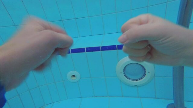 Dispute resolution mechanism. Rock paper scissors is a hand game played between two people underwater in pool. It's also called Roshambo. Nonverbal playing with friend.