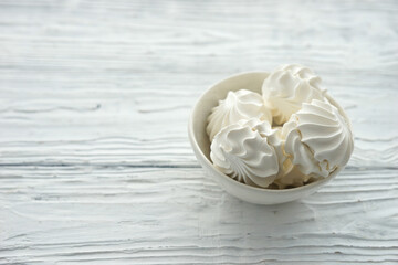 Zephyr in a ceramic bowl on a white wooden background