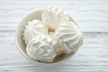 Zephyr in a ceramic bowl on a white wooden background