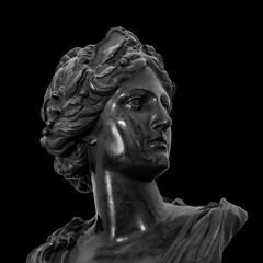 Ancient white marble sculpture head of young woman. Statue of sensual renaissance art era naked...