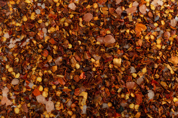 Red Chilli Pepper Flakes with Seeds Texture Background