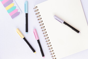 School and office Supplies on a glitter background