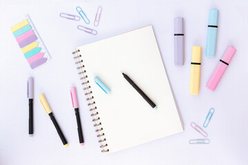 School and office Supplies on a glitter background