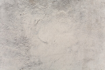 Background in the form of a gray cemented wall.