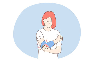 Suffering from pain in muscles, joints, injuries concept. Young unhappy woman cartoon character standing and holding painful elbow feeling strong pain. Trauma, chronic illness, inflammation