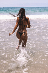 beach, sea, woman, water, ocean, summer, bikini, young, waves, fun, vacation, boy, sand, holiday, running, wave, beautiful, people, surf, blue, beauty, sky, jumping, nature, happy