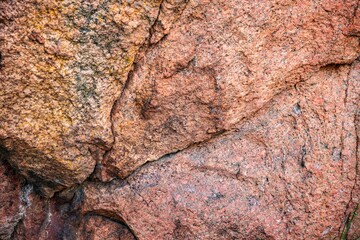 An unusual stone in the sun in warm weather in the beautiful nature