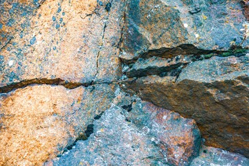 An unusual stone in the sun in warm weather in the beautiful nature