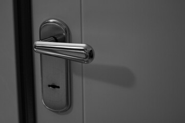 A steel handle of an armored door (Pesaro, Italy, Europe) - 405208578