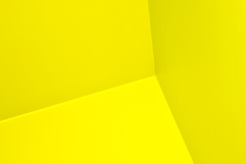 Abstract graphic background in yellow color. Straight lines on yellow wall, corner with three edges. Solid yellow background. Space for text