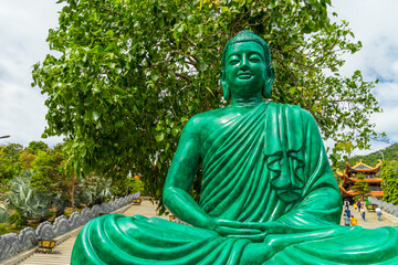 big statue of guanyin bodhisattva on mount in Ho Quoc pagoda (Vietnamese name is Truc Lam Thien Vien) with , Phu Quoc island, Vietnam