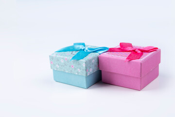 Small colorful gift boxes. Minimal composition on white background