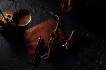Notary tools. Scales of justice, envelope and wooden gavel.