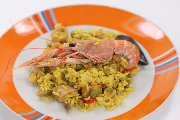 rotisserie prepared Valencian paella risotto with sea fish rotisserie prepared Valencian paella risotto with sea fish