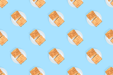 Waffles seamless pattern. Appetizing waffles on a white plate.