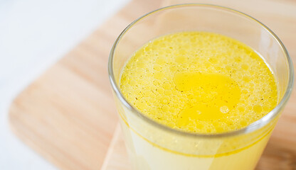 macro chicken broth, bouillon, clear soup in a glass