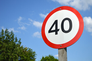 Road sign of speed limit with the number 40.