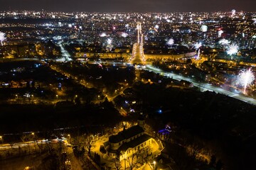 Many fireworks new year celebration in the city. New year, fete, picnic fireworks show. Dabrowa gornicza, silesia poland aerial drone view