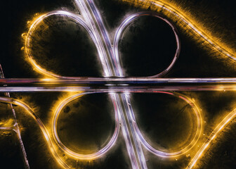 Ring road illuminated at night aerial drone view. Dabrowa Gornicza, Silesia Poland - obrazy, fototapety, plakaty