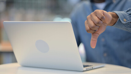 Man Working on Laptop and Showing Thumbs Down, Close Up 
