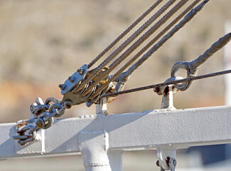 metallic pulley block and ropes