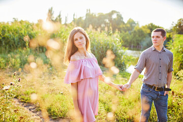 Fototapeta premium Portrait of young couple in summer