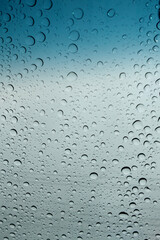 Rain drops on window glass surface 