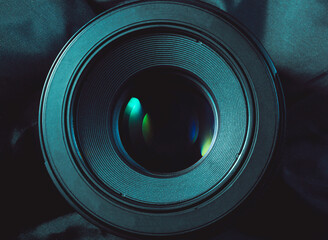 Fototapeta na wymiar Camera lens with lense reflections.